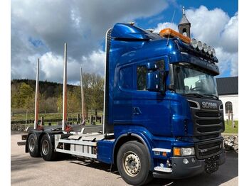 Scania R730  - camião de transporte de madeira