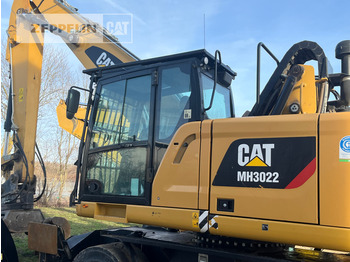 Manipulador de material CATERPILLAR MH3022