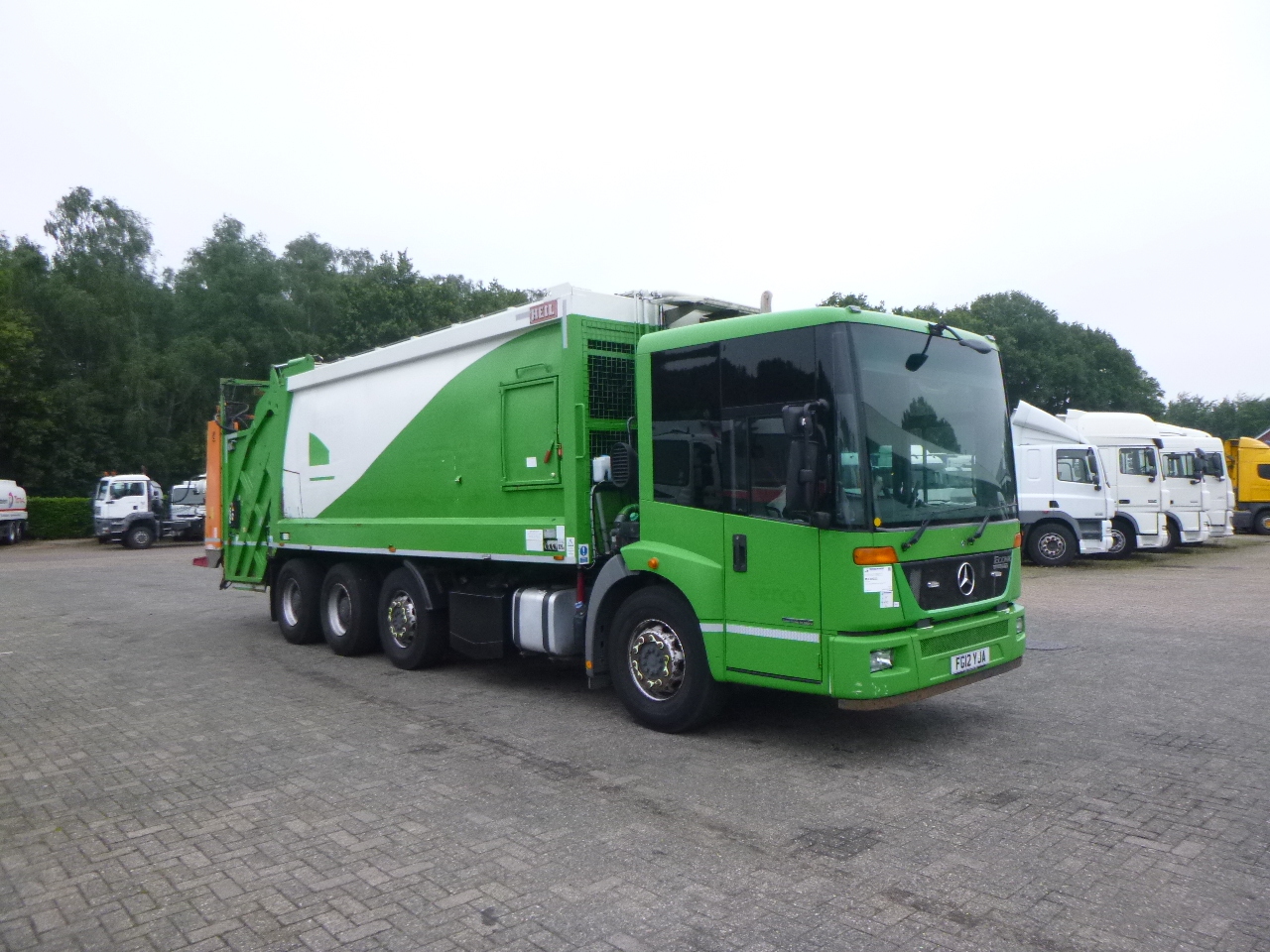Caminhão de lixo Mercedes Econic 3233 8X4 RHD Euro 5 refuse truck: foto 2