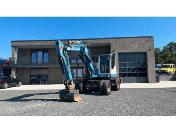 Escavadeira de rodas TEREX