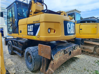 Escavadeira de rodas CATERPILLAR M318D MH