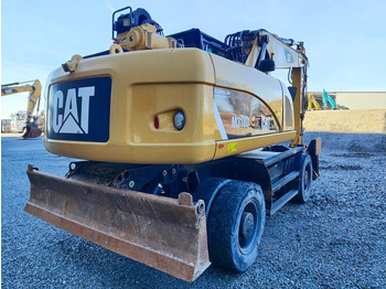 Escavadeira de rodas CATERPILLAR M318D MH