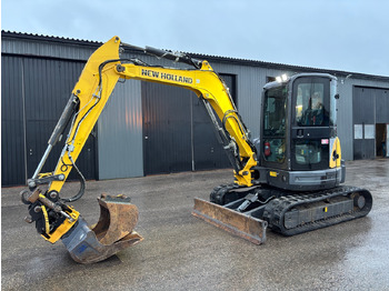 Escavadeira NEW HOLLAND