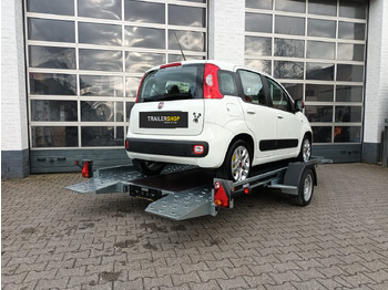 Reboque porta máquinas