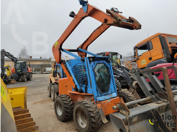 Mini pá carregadora NEW HOLLAND