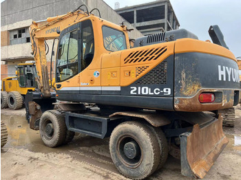 Escavadeira de rodas HYUNDAI 210W-9: foto 3
