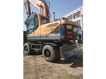 Escavadeira de rodas HYUNDAI 210W-9: foto 3