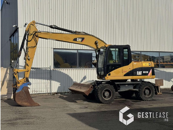 Escavadeira de rodas CATERPILLAR M313D