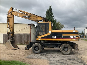 Escavadeira de rodas CATERPILLAR M320