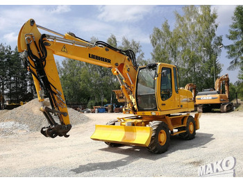 Escavadeira de rodas LIEBHERR A 314