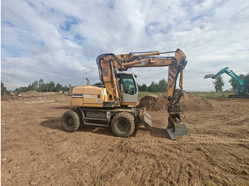 Escavadeira de rodas LIEBHERR A312: foto 3