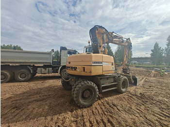 Escavadeira de rodas LIEBHERR A312: foto 4
