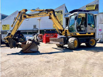 Escavadeira de rodas NEW HOLLAND