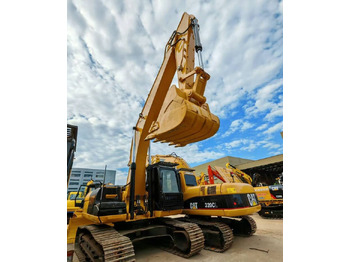 Escavadeira de rodas CATERPILLAR 320CL