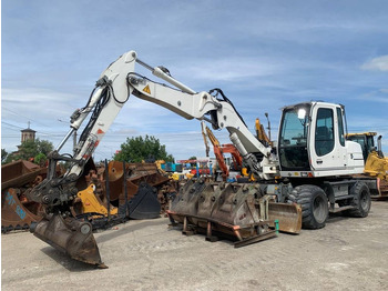 Escavadeira de rodas LIEBHERR A 311