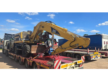 Escavadeira de rodas CATERPILLAR M312