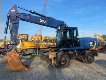 Escavadeira de rodas CATERPILLAR M322D