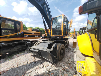 Escavadeira de rodas HYUNDAI R210W-9: foto 4