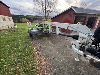 Máquina para produção de feno CLAAS