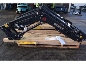 Carregador frontal para o trator STOLL