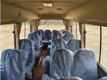 Locação financeira de Toyota Coaster Toyota Coaster: foto 2
