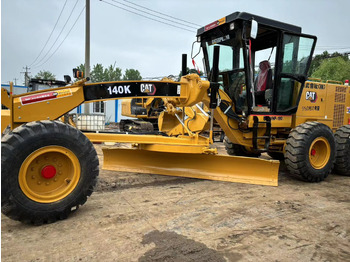 Máquina de construção CATERPILLAR 140K