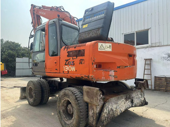 Escavadeira de rodas novo HITACHI ZX130: foto 3
