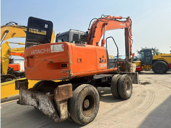 Escavadeira de rodas novo HITACHI ZX130: foto 2