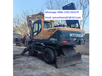 Escavadeira de rodas HYUNDAI R210