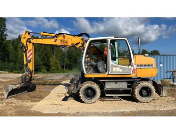 Escavadeira de rodas LIEBHERR A 314
