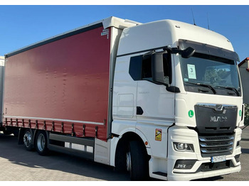 Máquina de outro MAN TGX 26.470 z przyczepą Redos: foto 3