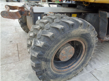 Escavadeira de rodas New Holland MH 4.6: foto 4