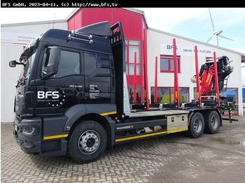 Camião de transporte de madeira MAN TGS
