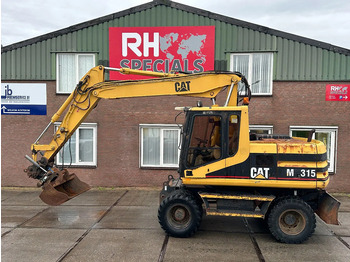 Escavadeira de rodas CATERPILLAR M315