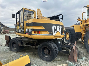 Escavadeira de rodas Caterpillar 312: foto 5