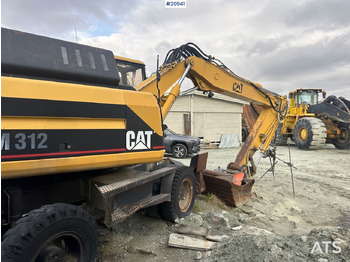 Escavadeira de rodas Caterpillar 312: foto 4