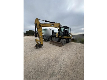 Escavadeira de rodas CATERPILLAR M313D