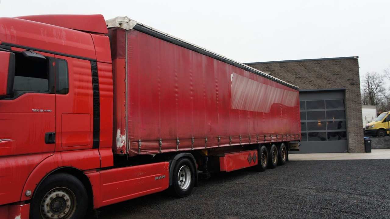 Schmitz Cargobull S01 Pritsche + Plane SAF-Achsen - Semi-reboque de lona: foto 1 Schmitz Cargobull S01 Pritsche + Plane SAF-Achsen - Semi-reboque de lona: foto 1