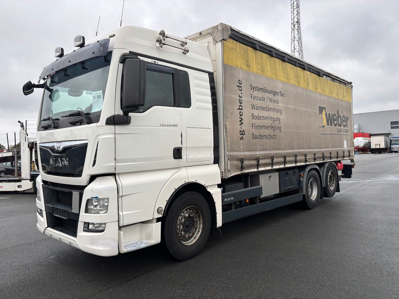 MAN TGX 26.480 mit Ladebordwand - Camião de lona: foto 1 MAN TGX 26.480 mit Ladebordwand - Camião de lona: foto 1