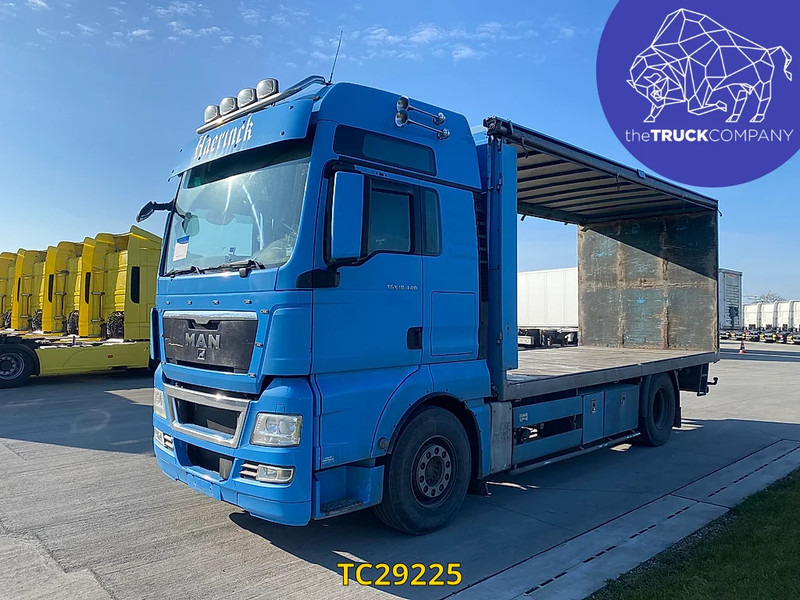 MAN TGX 440 - Camião de caixa aberta/ Plataforma: foto 1 MAN TGX 440 - Camião de caixa aberta/ Plataforma: foto 1