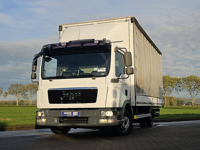 MAN 8.180 TGL - Camião de lona: foto 1 MAN 8.180 TGL - Camião de lona: foto 1