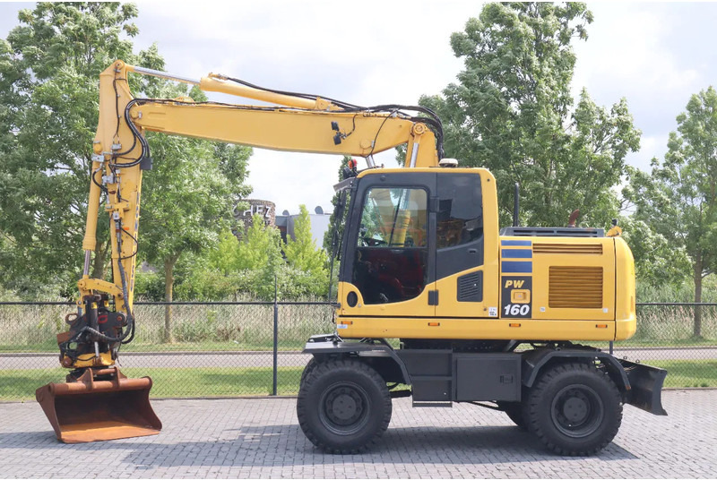 Komatsu PW 160-10 | ROTOTILT | NEW TIRES - Escavadeira de rodas: foto 1 Komatsu PW 160-10 | ROTOTILT | NEW TIRES - Escavadeira de rodas: foto 1