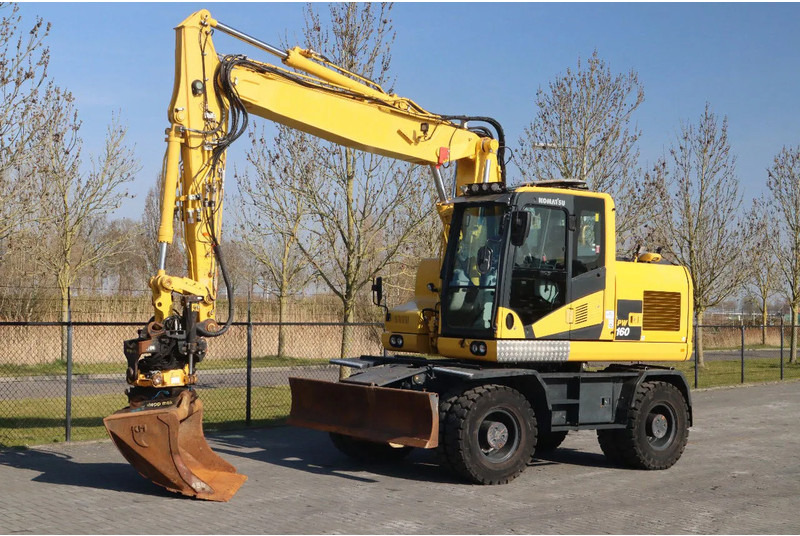 Komatsu PW160-11 | ENGCON TILTROTATOR | BUCKET | TRAILER HYDR. - Escavadeira de rodas: foto 2 Komatsu PW160-11 | ENGCON TILTROTATOR | BUCKET | TRAILER HYDR. - Escavadeira de rodas: foto 2