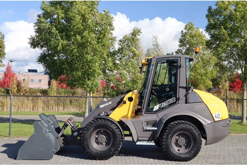Mecalac AF 1200 | NEW / UNUSED | 40 KM/H | BUCKET | FULL OPTION - Pá carregadora de rodas: foto 1 Mecalac AF 1200 | NEW / UNUSED | 40 KM/H | BUCKET | FULL OPTION - Pá carregadora de rodas: foto 1