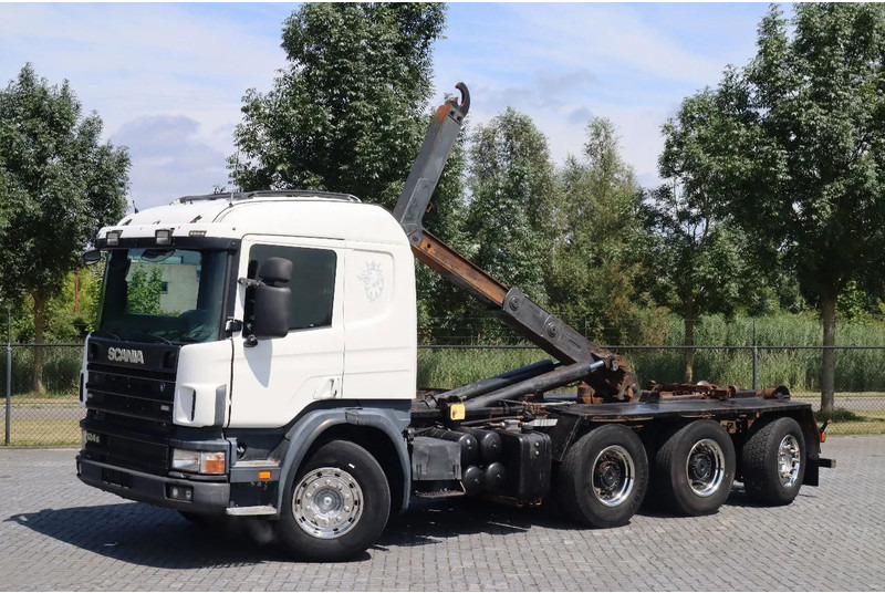 Scania P124-420 | 8X4 | HOOKLIFT | MANUAL | BIG AXLES | EURO 3 - Camião polibenne: foto 1 Scania P124-420 | 8X4 | HOOKLIFT | MANUAL | BIG AXLES | EURO 3 - Camião polibenne: foto 1