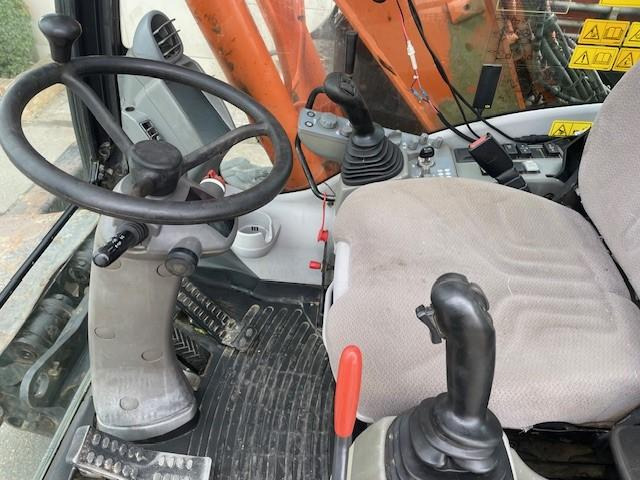 Escavadeira de rodas Hitachi ZX140W-5B: foto 8