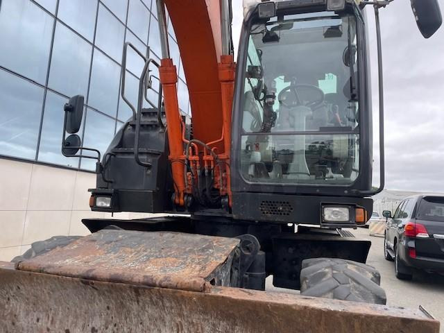 Escavadeira de rodas Hitachi ZX140W-5B: foto 6