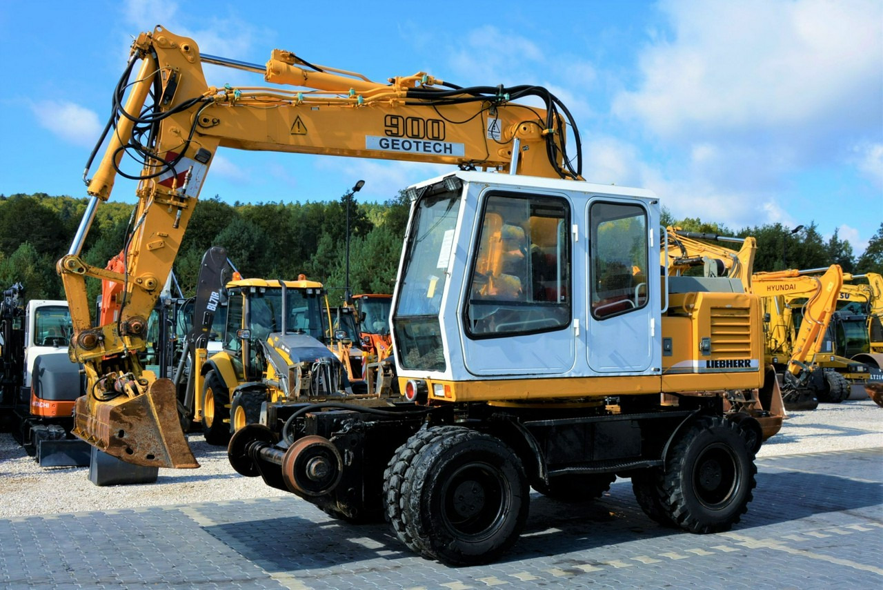 Liebherr A 900 ZW Litronic Koparka + Kolej - Escavadeira de rodas: foto 1 Liebherr A 900 ZW Litronic Koparka + Kolej - Escavadeira de rodas: foto 1