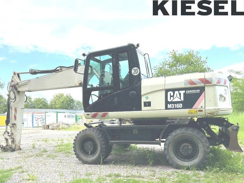 CAT M 316 D - Escavadeira de rodas: foto 1 CAT M 316 D - Escavadeira de rodas: foto 1