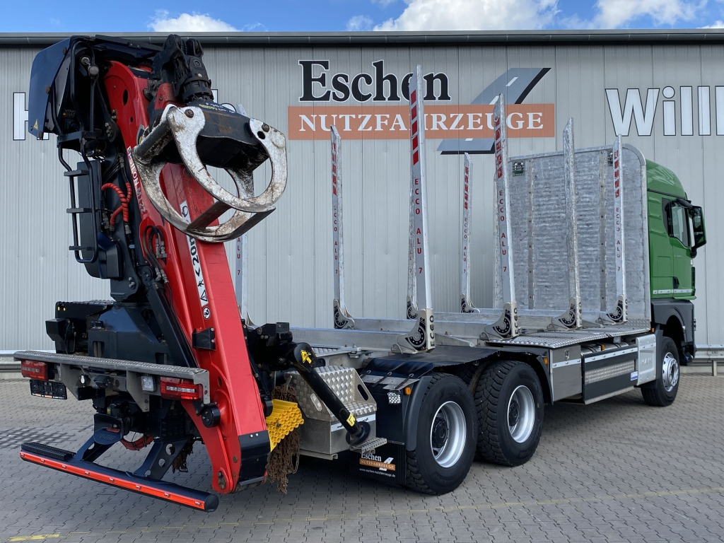 MAN TGX 33.580 6x4 BB Kurzholzaufbau / Kran - Camião de transporte de madeira, Camião grua: foto 5 MAN TGX 33.580 6x4 BB Kurzholzaufbau / Kran - Camião de transporte de madeira, Camião grua: foto 5